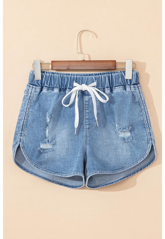 High waist design for a flattering fit showing a sexy curve
  Distressed detailing adds a fashion
  forward edge
  Adjustable drawstring for customized comfort
  Versatile style for casual or chic looks
Material: 93% Cotton 5% polyester 2% Elastane