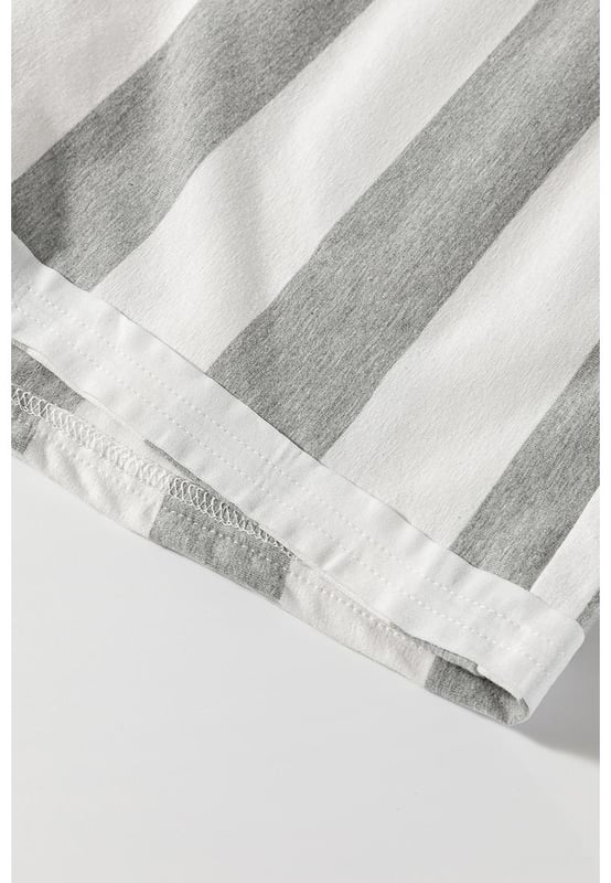 Our styles are designed with a trendy fitted look in mind following an international size standard. For the best fit we suggest choosing one size up from your usual. Be sure to check our sizing chart to find your perfect match!
  Two
  piece set featuring a top and shorts
  Mixed striped prints for a dynamic look
  Short sleeves for a relaxed fit
  Side pockets on the shorts for added convenience
Material: 95% Cotton 5% Elastane