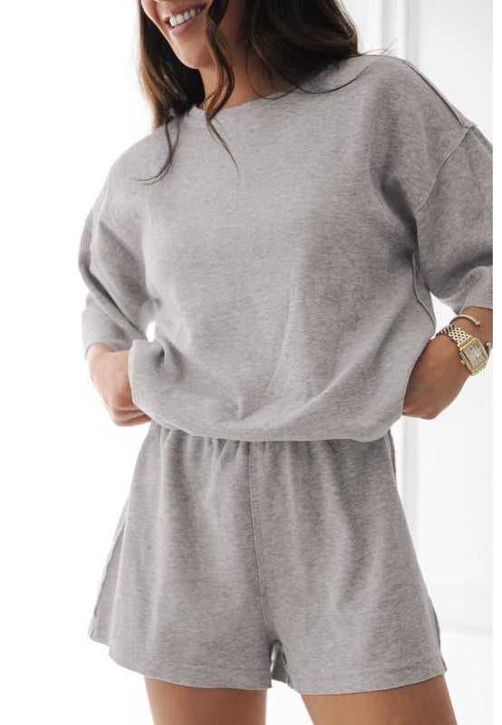 Solid color design offers a timeless and versatile look
  Loose tee provides a relaxed and comfortable fit on hot days
  Set includes matching shorts for a coordinated and effortless style
  Made from soft breathable fabric for all
  day comfort
Material: 75% Polyester 20% Viscose 5% Elastane
