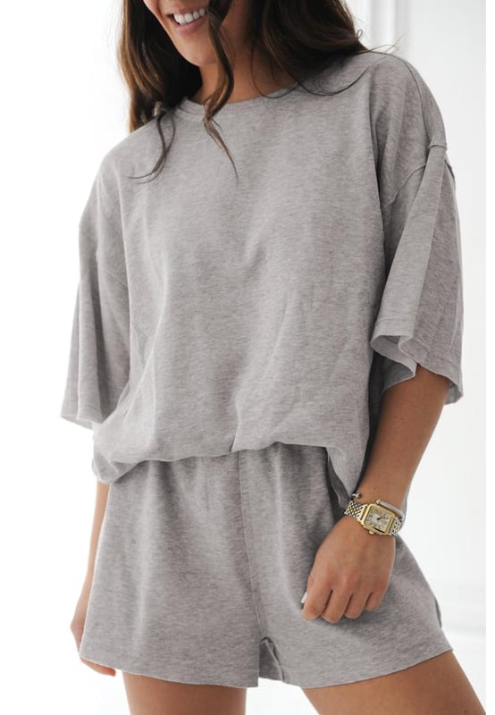Solid color design offers a timeless and versatile look
  Loose tee provides a relaxed and comfortable fit on hot days
  Set includes matching shorts for a coordinated and effortless style
  Made from soft breathable fabric for all
  day comfort
Material: 75% Polyester 20% Viscose 5% Elastane