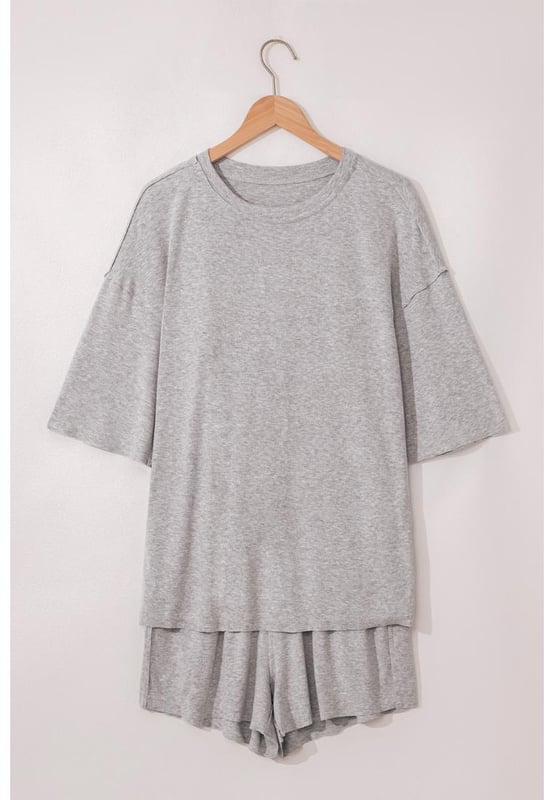 Solid color design offers a timeless and versatile look
  Loose tee provides a relaxed and comfortable fit on hot days
  Set includes matching shorts for a coordinated and effortless style
  Made from soft breathable fabric for all
  day comfort
Material: 75% Polyester 20% Viscose 5% Elastane