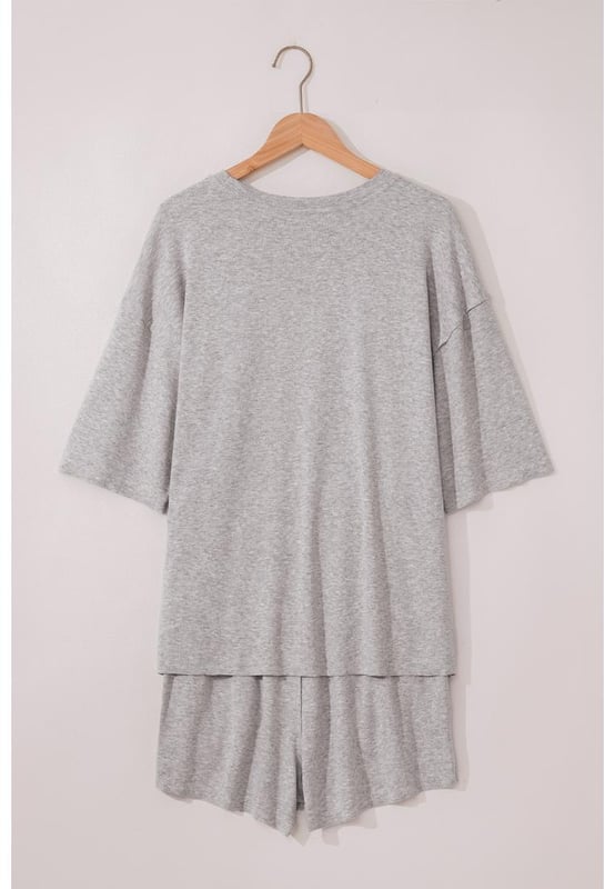Solid color design offers a timeless and versatile look
  Loose tee provides a relaxed and comfortable fit on hot days
  Set includes matching shorts for a coordinated and effortless style
  Made from soft breathable fabric for all
  day comfort
Material: 75% Polyester 20% Viscose 5% Elastane