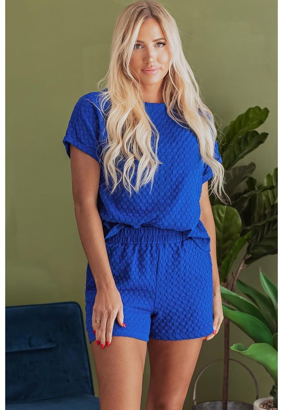Our styles are designed with a trendy fitted look in mind following an international size standard. For the best fit we suggest choosing one size up from your usual. Be sure to check our sizing chart to find your perfect match!
  Jacquard textured fabric for a unique wear
  Loose fit tee with cuffed sleeves
  Decorative button details
  Matching shorts with elastic waist
  Side pockets for convenience
  Suitable for various occasions
Material: 95% Polyester 5% Elastane