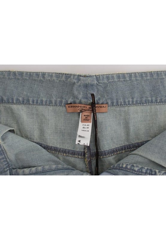 Ermanno Scervino Beachwear Denim Shorts
  Brand new with tags
  100% Authentic
  Material: 100% Cotton
  Color: Blue
  Model: Denim
  Button and zip closure in the front
  Logo details