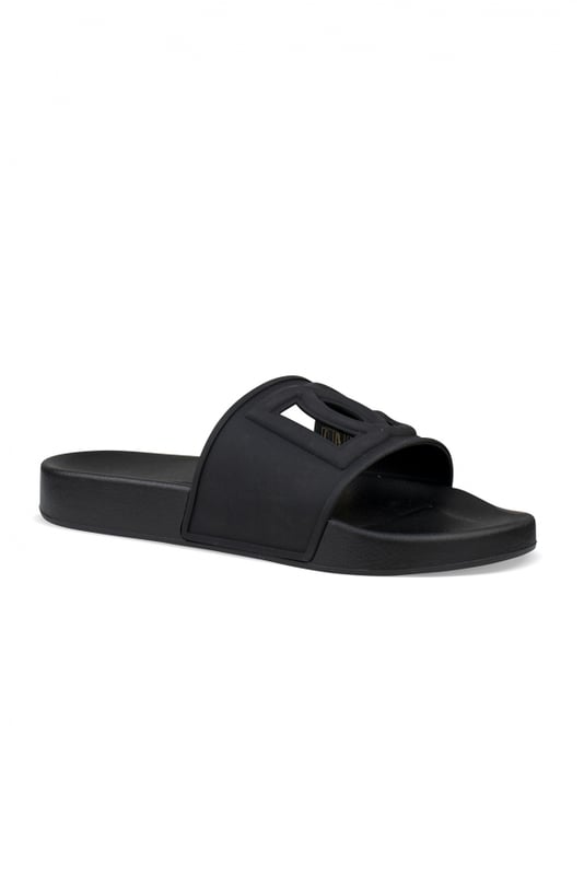 Dolce&Gabbana Slippers Zwart Dolce & Gabbana-slippers van zwart rubber.Logo in reliëf in het midden met openingen.Platte zool.Gemaakt in Italië.