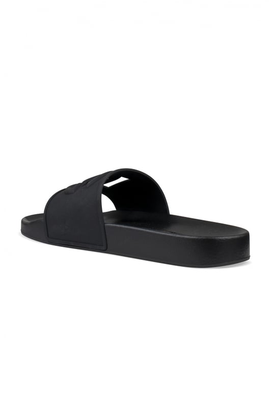 Dolce&Gabbana Slippers Zwart Dolce & Gabbana-slippers van zwart rubber.Logo in reliëf in het midden met openingen.Platte zool.Gemaakt in Italië.
