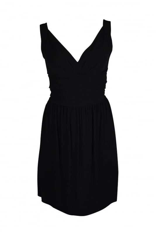 Vestido negro de tirantes Balenciaga.Cinturón de volantes en la cintura.Cierre de cremallera en la espalda.Made in France.