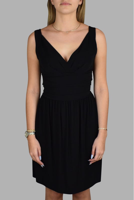 Vestido negro de tirantes Balenciaga.Cinturón de volantes en la cintura.Cierre de cremallera en la espalda.Made in France.