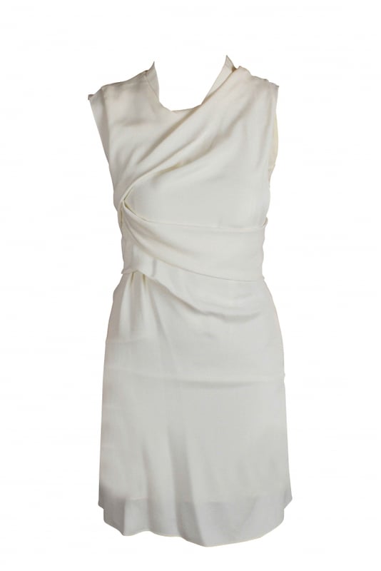 Vestido blanco de Prada.Patrones de corazones rojos.Cierre con cremallera en el lateral.98% viscosa y 2% otras fibras.Made in italy.