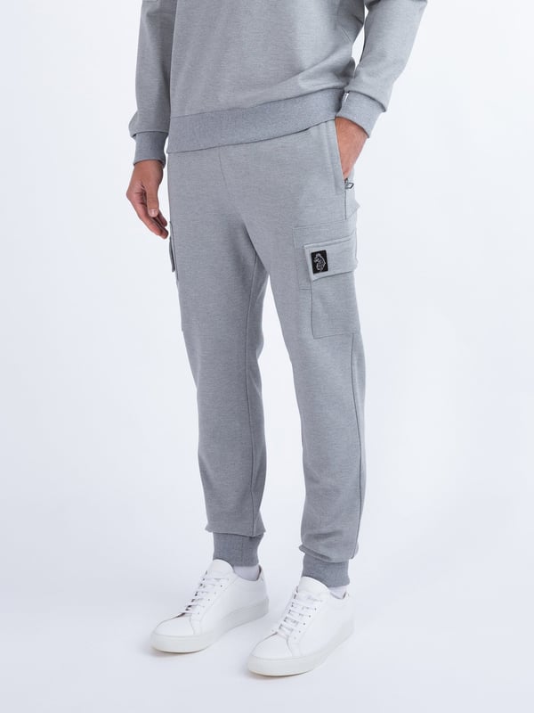LUKE Mainline is all about creating well-crafted, premium wardrobe essentials and these joggers are a case in point. They feature a comfy drawcord waist, essential side zip pockets, a patch pocket on each leg and soft rib cuffs. They are detailed with dark pewter gloss trims and are complete with brands iconic raised metal lion felt badge on the left leg.