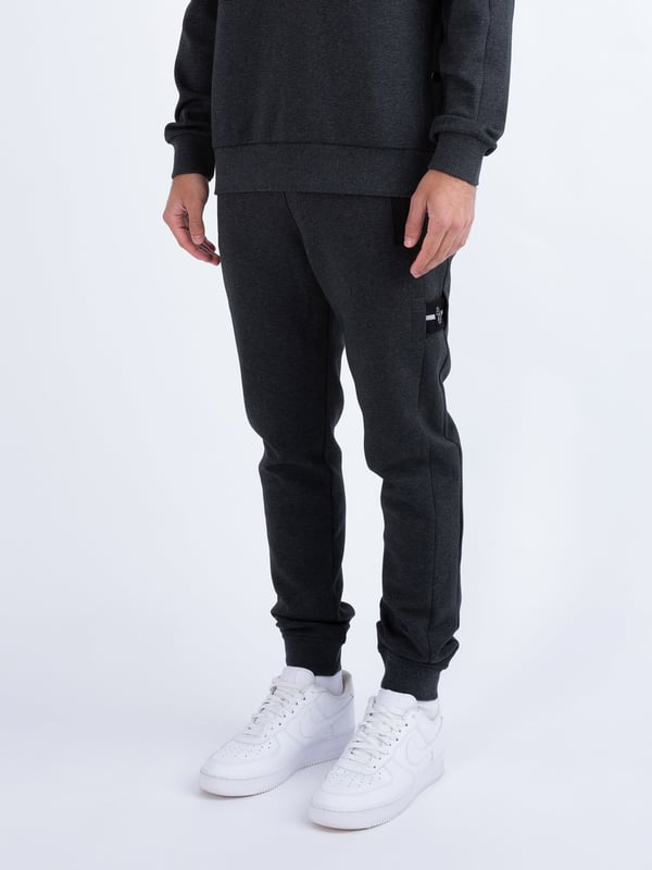 These premium joggers from LUKE are crafted from a smooth luxe touch fabrication, detailed with metal trims, and feature handy zip pockets, perfect for all your essentials. They are fitted with a comfy drawcord waistband for a customised fit and are detailed with a detachable striped tape on the left leg. The look is then signed off with the brands iconic shiny raised metal lion felt badge.