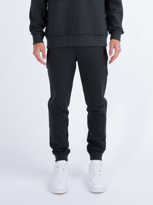 These premium joggers from LUKE are crafted from a smooth luxe touch fabrication, detailed with metal trims, and feature handy zip pockets, perfect for all your essentials. They are fitted with a comfy drawcord waistband for a customised fit and are detailed with a detachable striped tape on the left leg. The look is then signed off with the brands iconic shiny raised metal lion felt badge.