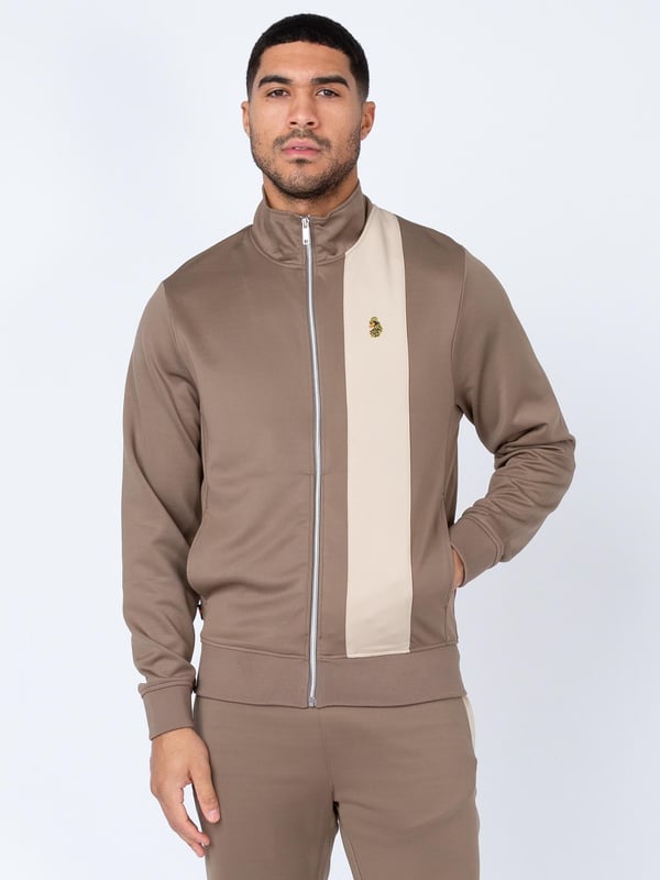 When it comes to sportswear staples, LUKE have you covered with this zip through sweat. Crafted from a stretchy tricot, it is detailed with a funnel neck and soft rib trims throughout. It features a cut and sew contrast vertical panel and is complete with the brands iconic lion head embroidery on the left chest.