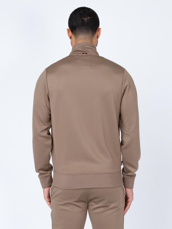 When it comes to sportswear staples, LUKE have you covered with this zip through sweat. Crafted from a stretchy tricot, it is detailed with a funnel neck and soft rib trims throughout. It features a cut and sew contrast vertical panel and is complete with the brands iconic lion head embroidery on the left chest.