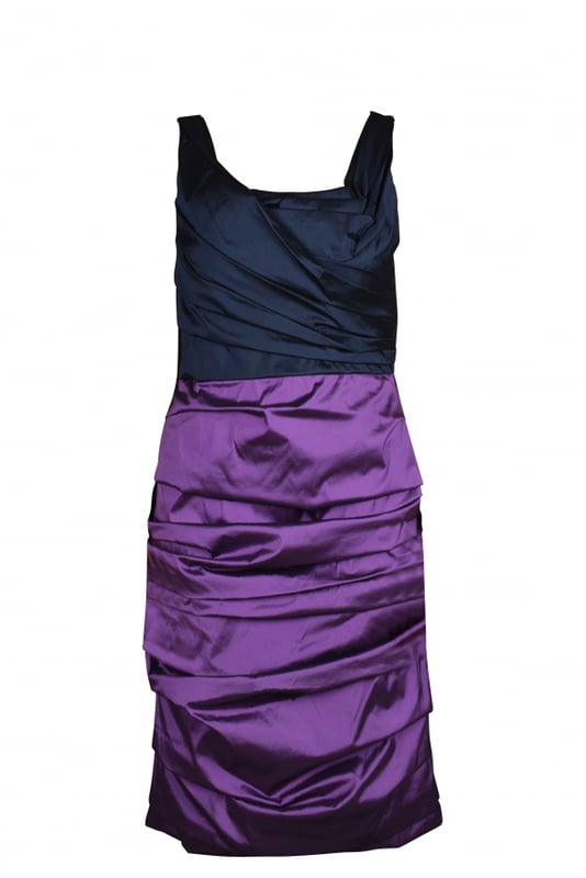 Vestido Dolce & Gabbana azul marino y morado.Cierre de cremallera en la espalda.Detalles de tejido plisado a lo largo.60% seda, 26% poliamida y 8% elastano.Made in Italy.