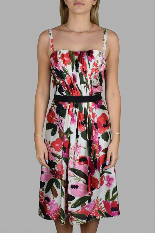 Vestido de tirantes Dolce & Gabbana con estampado floral.Busto con corsé integrado y cinturón negro.Cierre de cremallera en la espalda.100% seda.Made in Italy.