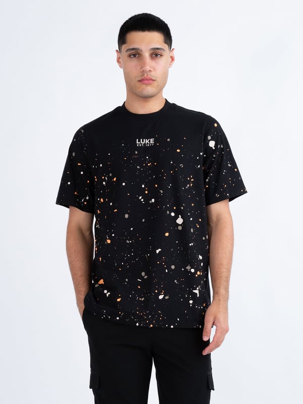 This stylish, paint splatter tee from LUKE is sure to be your go to this season. Cut to a relaxed fit, it is styled with a soft rib crew neck for all day comfort and features a LUKE EST. 1977 text print at the centre of the chest.