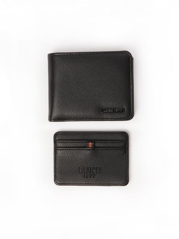 Elevate your accessory game with this stylish and essential set. The meticulously crafted ensemble includes a wallet and card holder and is the perfect addition to your collection. It could just as easily make a fantastic gift for those with style.