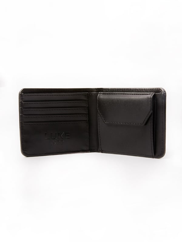 Elevate your accessory game with this stylish and essential set. The meticulously crafted ensemble includes a wallet and card holder and is the perfect addition to your collection. It could just as easily make a fantastic gift for those with style.