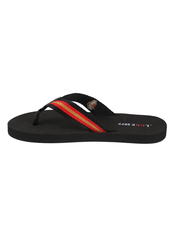Elevate your down-time wardrobe with these LUKE canvas strap flip flops. They are detailed with the brand's iconic lion head embroidery and are stamped with the LUKE 1977 graphic on the sole.