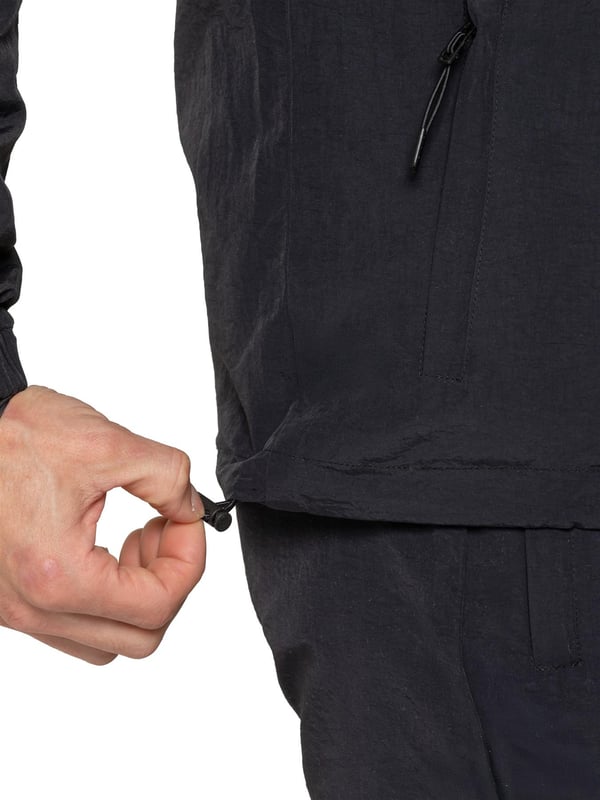 The Enzo Milano Men’s Lightweight Cargo Jacket is a sleek, functional outer layer made from water-repellent crushed poly fabric with a breathable mesh lining for all-day comfort. Designed in a regular fit, it features a full zip front, high neck, and adjustable drawcord hood for versatile coverage. With two Velcro chest pockets, two zippered side pockets, elasticated cuffs, and an adjustable drawcord hem, it offers both style and practicality—perfect for layering in changing weather.