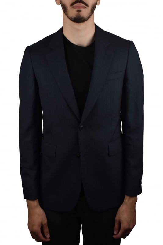 Chaqueta de traje Burberry azul marino a rayas.De lana y viscosa.Bolsillos laterales con solapa.Bolsillo en el pecho.Cierre con un botón.Made in Italy.