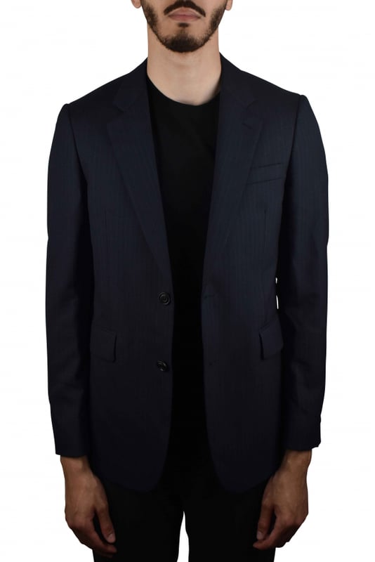 Chaqueta de traje Burberry azul marino a rayas.De lana y viscosa.Bolsillos laterales con solapa.Bolsillo en el pecho.Cierre con un botón.Made in Italy.