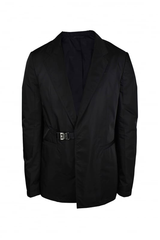 Chaqueta Givenchy de nailon negro.Cierre lateral con hebilla metálica plateada.Cuello con solapa de muesca.Dos bolsillos laterales.100% poliéster.