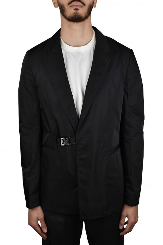 Chaqueta Givenchy de nailon negro.Cierre lateral con hebilla metálica plateada.Cuello con solapa de muesca.Dos bolsillos laterales.100% poliéster.