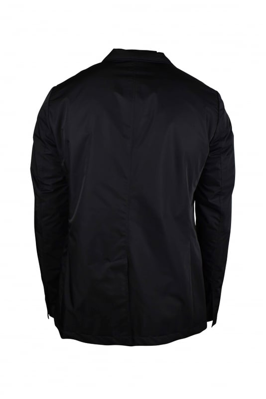Chaqueta Givenchy de nailon negro.Cierre lateral con hebilla metálica plateada.Cuello con solapa de muesca.Dos bolsillos laterales.100% poliéster.