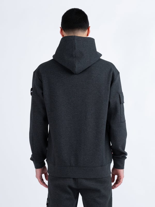 This premium hoodie from LUKE is crafted from a smooth luxe touch fabrication, cut to a relaxed fit and detailed with dark pewter gloss trims. It features a zip pocket on the right sleeve and handy lower front pockets. The hood is styled with a magnetic snap button at the front and the left sleeve is styled with a detachable striped tape detailed with the brands iconic shiny raised metal lion felt badge.