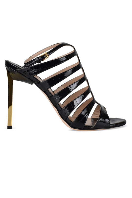 Sandalias de piel negra efecto cocodrilo de Tom Ford.Estilo de tiras. Hebilla en el tobillo.Acabados dorados.Tacón de espejo dorado.Puntera abierta redondeada.Altura del tacón 12 cm.Made in Italy.