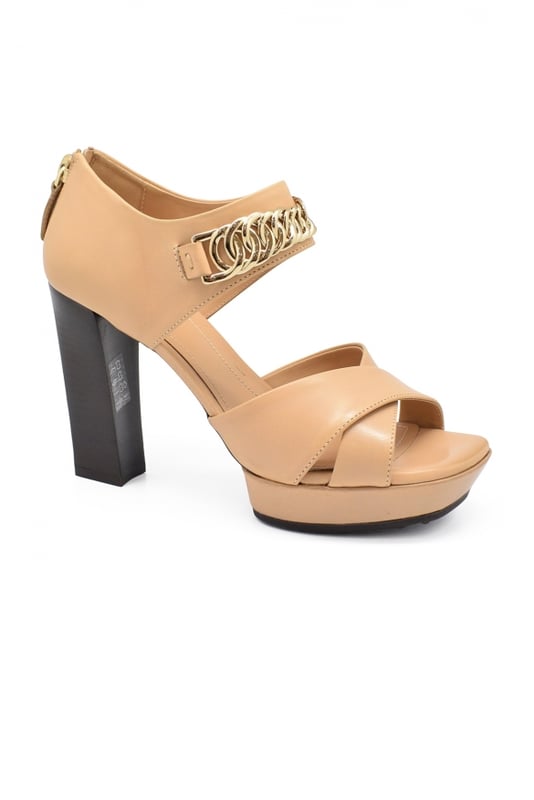 Tod's sandalen van nudeleer met open neus.Hak 10 cm.Made in Italy.