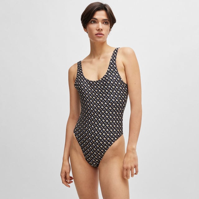 Womens BOSS Mimi Low-back swimsuit with monogram patternA distinctive swimsuit by BOSS  designed in stretch material with all-over monograms  a low-cut back and moulded cups.- Main material: 88% Polyester (recycled)  12% Elastane.  Lining: 72% Polyamide  28% Elastane.  Machine washable.- Ref: 50516429-004Please note that returns will only be accepted if the hygiene label is still attached to the product.