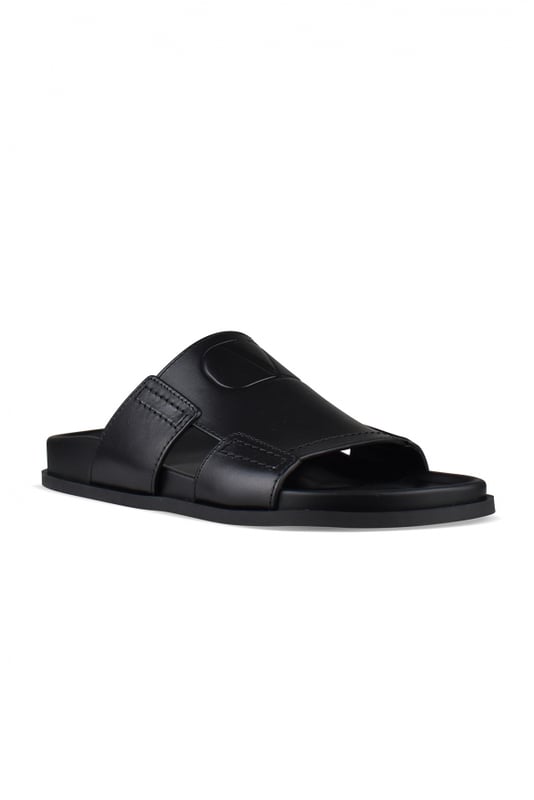 Sandalias Valentino VLogo de piel negra.Logotipo  V  en relieve.Suela negra.Made in Italy.