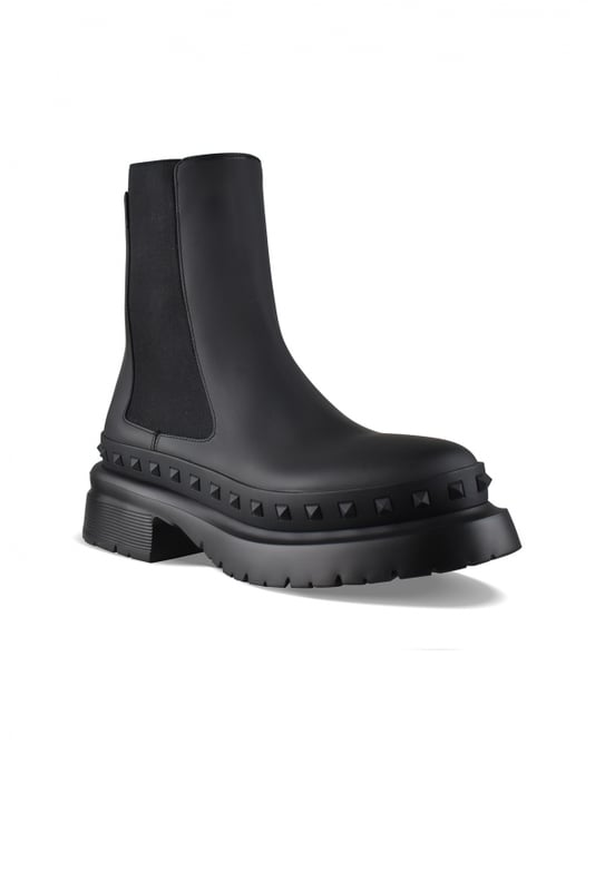 Botas M-Way Rockstud Chelsea de Valentino en piel negra.Tachuelas decorativas negras alrededor de la suela.Lengüeta de piel en la parte trasera.Suela gruesa negra de 5 cm.Puntera redondeada.Made in Italy.