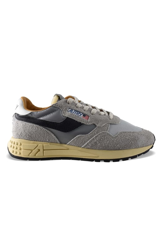 Sneakers bajas Reelwind Autry de nailon y ante gris.Parche con logotipo en el exterior.Banda de cuero negro en el exterior. Contrafuerte de cuero blanco con logotipo.Lengüeta con parche del logotipo.Suela de goma con efecto amarilleado.Logotipo en relieve en la suela. Cierre con cordones.