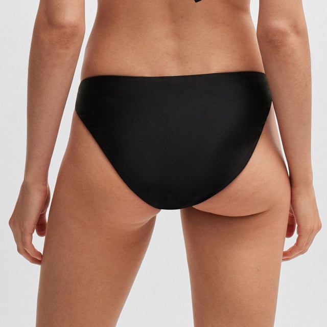 Womens BOSS Fully Lined Bikini Bottoms with Double B monogram in black.Bikini bottoms crafted in lustrous stretch fabric by BOSS. Trimmed with an elegant Double B monogram  this pair is fully lined for comfort.Main material: 65% Polyamide  35% Elastane.  Lining: 88% Polyester  12% Elastane.  Ref: 50515504-001Please note that returns will only be accepted if the hygiene label is still attached to the product.