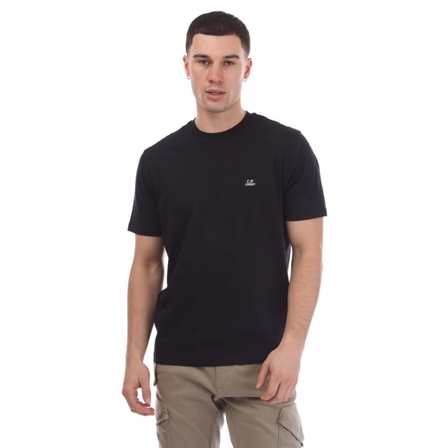 Mens C.P. Company 30-1 Jersey Logo Patch T-Shirt in navy.- Ribbed crew neck.- Short sleeves.- Chest embroidered logo patch.- Regular fit.- 100% Cotton.- Ref: 18CMTS031A888