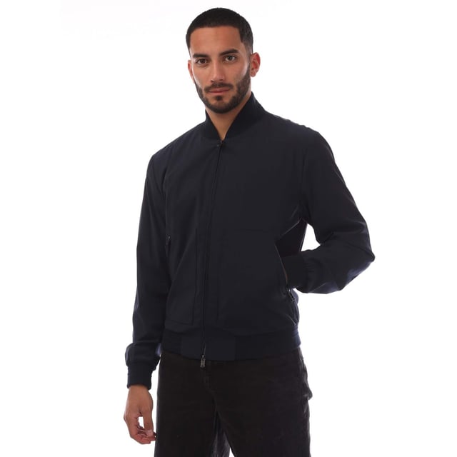 Men's Boss T-Heston-BMB Jacket.- Bomber collar.- Full front branded zip fastening.- Side zip pockets.- Inside zip pocket.- Ribbed cuffs and hem. Material: 67% Virgin Wool, 28% Polyamide, 5% Elastane. Ref: 50468749404.