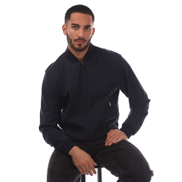 Men's Boss T-Heston-BMB Jacket.- Bomber collar.- Full front branded zip fastening.- Side zip pockets.- Inside zip pocket.- Ribbed cuffs and hem. Material: 67% Virgin Wool, 28% Polyamide, 5% Elastane. Ref: 50468749404.