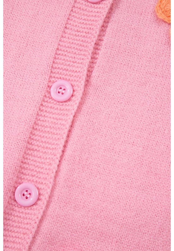 Our styles are designed with a trendy fitted look in mind following an international size standard. For the best fit we suggest choosing one size up from your usual. Be sure to check our sizing chart to find your perfect match!
  Vibrant knitted floral patterns for a playful look
  Cozy button
  up design ideal for chilly days
  Crafted from ultra
  soft comfortable fabric
  Perfect for styling with a casual tank top and jeans
  Adds a touch of charm to any outfit
Material: 42% Acrylic 30% Polyester 28% Polyamide