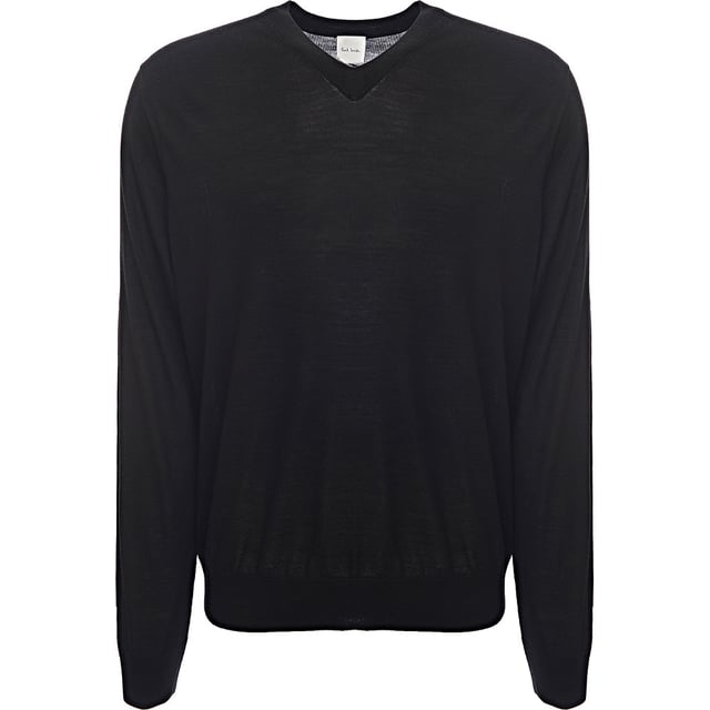 Elevate your essentials with the Paul Smith Men's Pullover Crew Neck in Black, crafted from 100% merino wool for a luxuriously soft feel. The classic crew neck design and sleek black color make this pullover a versatile addition to any wardrobe, perfect for layering or wearing on its own. The merino wool offers natural warmth and breathability, ensuring comfort throughout the day, while the refined fit provides a timeless, sophisticated silhouette. Ideal for both casual and more polished looks, this pullover is an effortless blend of style and function.
