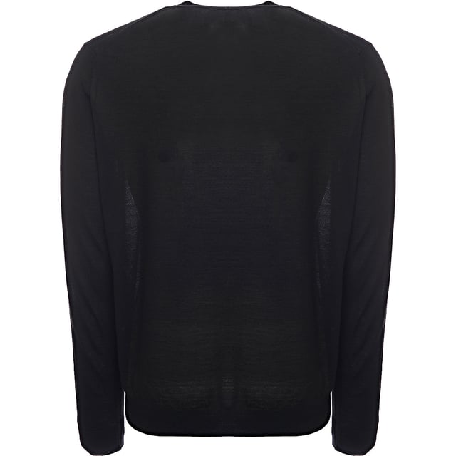 Elevate your essentials with the Paul Smith Men's Pullover Crew Neck in Black, crafted from 100% merino wool for a luxuriously soft feel. The classic crew neck design and sleek black color make this pullover a versatile addition to any wardrobe, perfect for layering or wearing on its own. The merino wool offers natural warmth and breathability, ensuring comfort throughout the day, while the refined fit provides a timeless, sophisticated silhouette. Ideal for both casual and more polished looks, this pullover is an effortless blend of style and function.