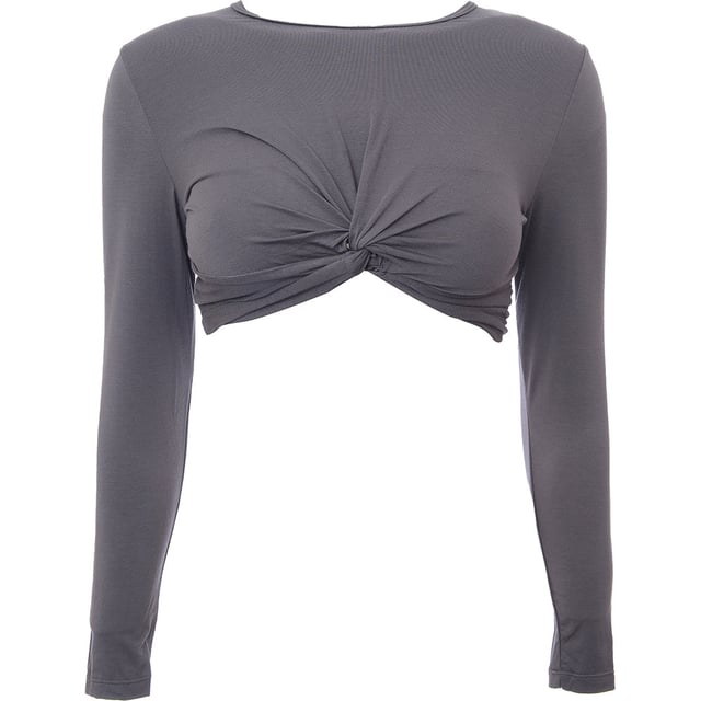 Elevate your activewear with the South Beach Women's Yoga Twist Front Long Sleeve Crop Top in Grey. This stylish crop top combines comfort, flexibility, and modern design, making it perfect for yoga, Pilates, or casual athleisure looks. The twist-front detail adds a fashionable touch, while the long sleeves provide coverage and warmth during cooler sessions. Crafted from a soft, stretchy fabric, it offers a flattering fit that moves with your body, ensuring freedom of movement and support. The versatile grey color pairs easily with leggings, shorts, or jeans, making it a must-have addition to your workout wardrobe or everyday outfits.

Soft, stretchy fabric for comfort and flexibility

Twist-front design for a stylish, on-trend look

Long sleeves for added coverage and warmth

Cropped length for a flattering, contemporary silhouette

Ideal for yoga, Pilates, or casual athleisure wear

The South Beach Women's Yoga Twist Front Long Sleeve Crop Top in Grey is the perfect combination of style and functionality, making it a must-have for the active woman who loves to look great while staying comfortable.