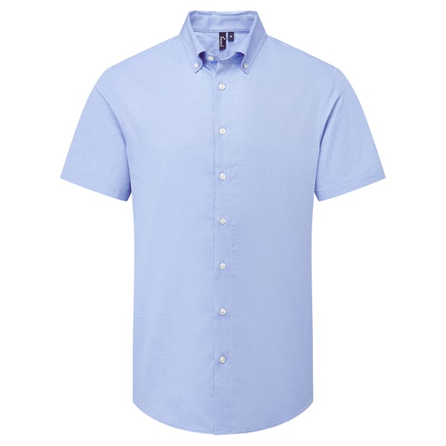 72% Mercerised Cotton, 25% Organic Cotton, 3% Elastane. Fabric: Stretch. Design: Plain. Fastening: Button. Hem: Curved. Cuff: Double Button. Sleeve-Type: Long-Sleeved. Neckline: Turn Down Collar. 2 Back Pleats, Back Darts, Back Yoke, Pearlised Buttons, Self-Coloured Buttons, Shape Retention. 135gsm. Sustainability: Amfori, BSCI, Oeko-Tex Standard 100 Certified, Sedex, WRAP Certified.