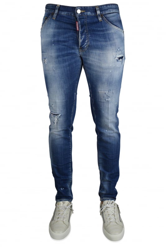 Cool Guy Jean Dsquared2 azul con efecto desgastado.Cinco bolsillos.Efecto rasgado.Logotipo y escritura en la parte trasera sobre un parche rojo.Cierre con botones.Efecto de desgaste.98% Algodón, 2% Elastano.Made in Italy.