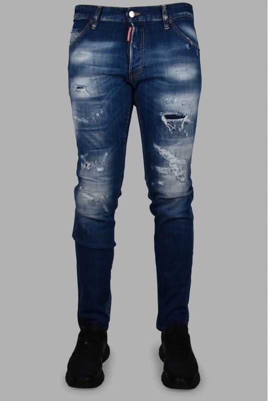 Vaqueros Dsquared2 Cool Guy de algodón azul.Efecto desteñido.Rasgaduras.Etiqueta roja del logotipo en la bragueta.Parche trasero beige.Cierre con botones.Trabillas.Cinco bolsillos, 2 de ellos traseros.Corte entallado.