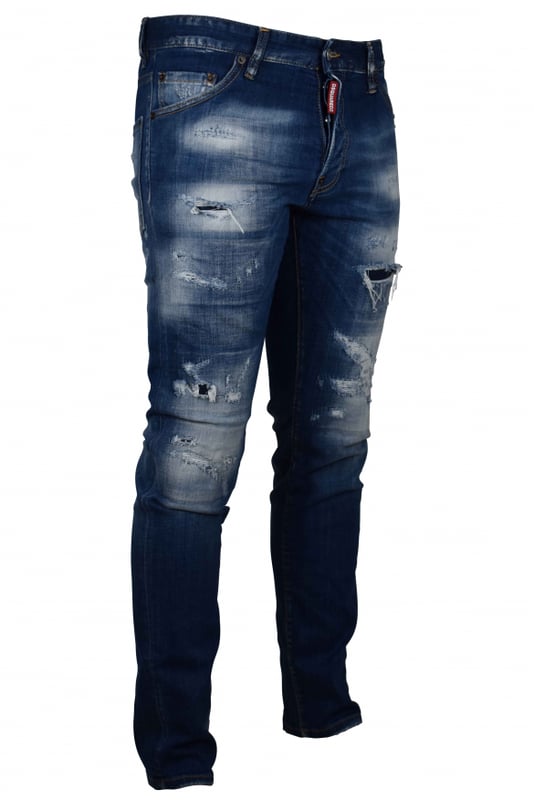Vaqueros Dsquared2 Cool Guy de algodón azul.Efecto desteñido.Rasgaduras.Etiqueta roja del logotipo en la bragueta.Parche trasero beige.Cierre con botones.Trabillas.Cinco bolsillos, 2 de ellos traseros.Corte entallado.