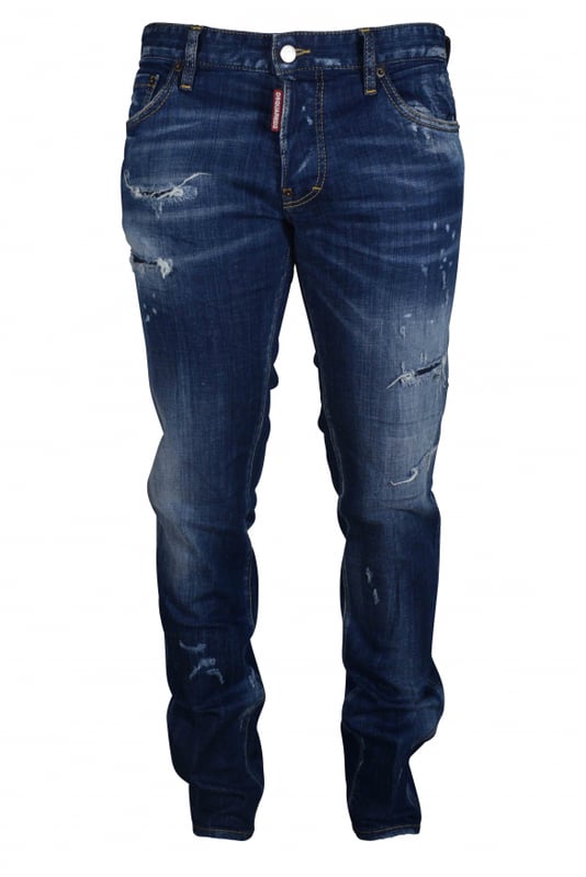 Cool Guy Jean Dsquared2 azul con efecto desgastado.Cinco bolsillos.Logotipo en la espalda en un parche gris y negro.Cierre con botones.98% Algodón, 2% Elastano.Made in Italy.